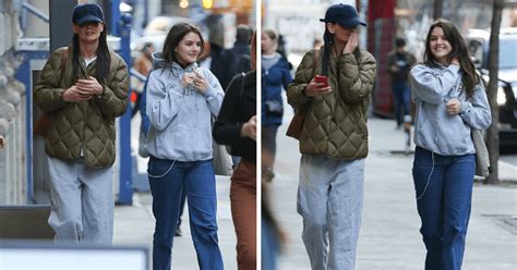 Suri Cruise Is Almost As Tall As Mom Katie Holmes Now Photos Meaww