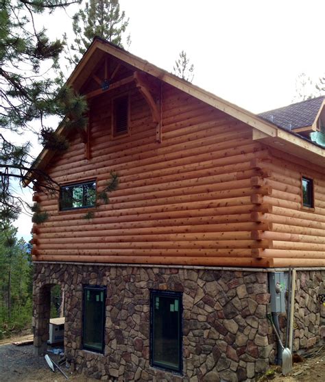 It doesn't get more traditional than log siding (otherwise know as cabin log siding)! Log Siding for Houses - Log Cabin Siding for Homes ...