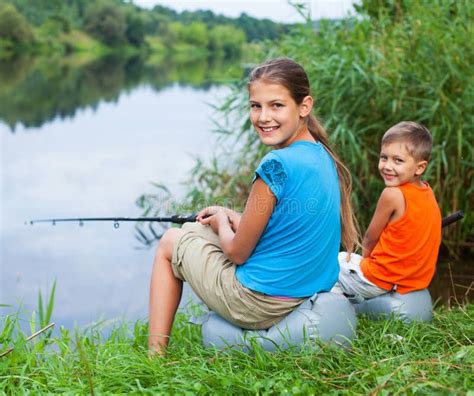 Kids Fishing At The River Stock Photo Image Of Lifestyle 50013748