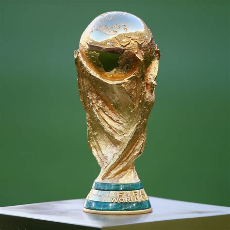 The replacement trophy, the fifa world cup trophy, was first used in 1974. World Cup 2014 Trophy Weight, FIFA Prize History, Gold ...