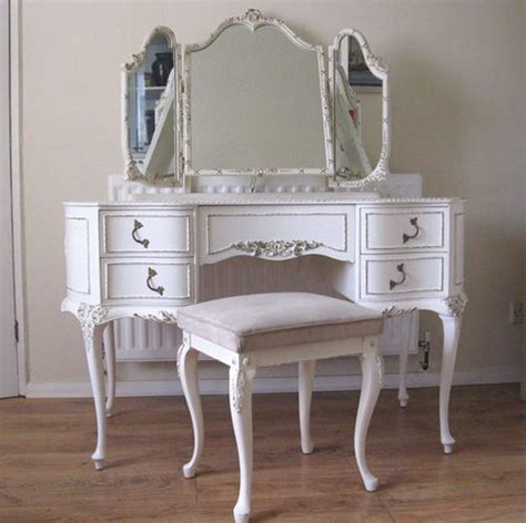 An Antique White Dressing Table With Mirror And Stool