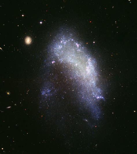 Fileirregular Galaxy Ngc 1427a Captured By The Hubble Space Telescope