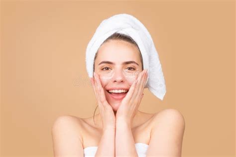 Happy Beautiful Girl With A Towel On Head Facial Treatment Cosmetology Beauty And Spa Stock