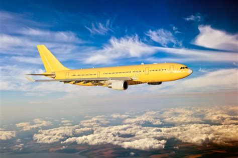 Side View Of Yellow Aircraft In Flight Stock Photo Image Of Aviation