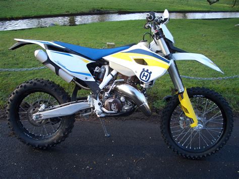 Kona 2014 bikes | enduro. 2014 Husqvarna TE125 2-stroke Enduro bike, white/blue