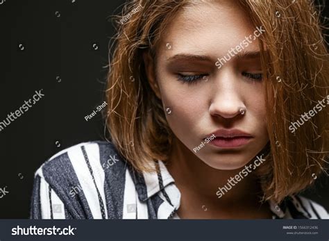 Sad Teenage Girl On Dark Background Stock Photo 1566312436 Shutterstock