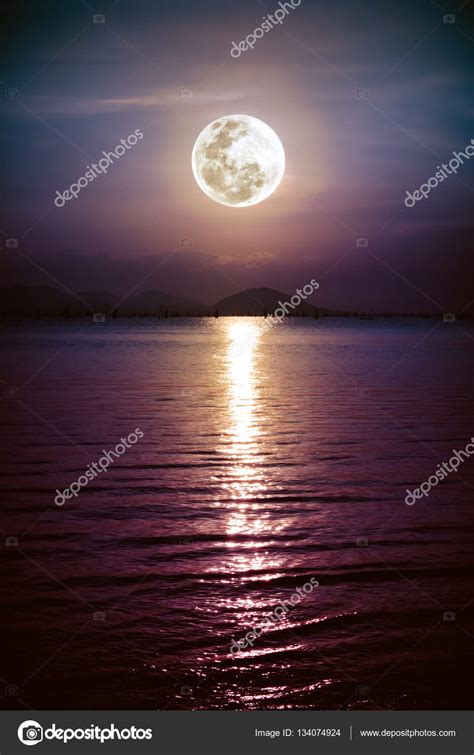 Romantic Scenic With Full Moon On Sea To Night Reflection Of Moon In
