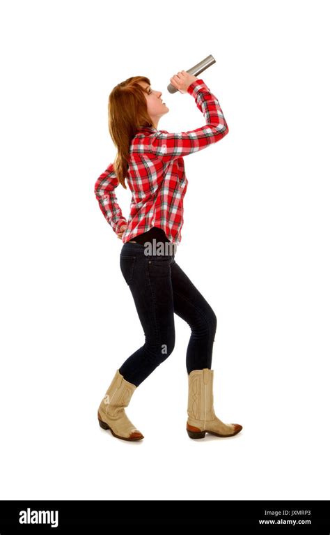 Female Country Western Singer Poses With Microphone Stock Photo Alamy