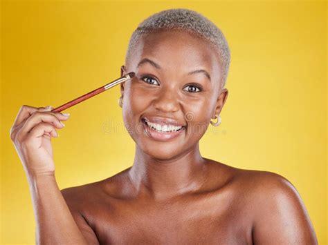 Beauty Cosmetics And Portrait Of Black Woman With Brush In Hand In Studio And Skincare Isolated