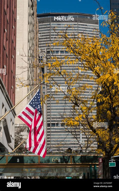 American Flag On Park Avenue With Midtown Skyline Nyc Usa Stock Photo