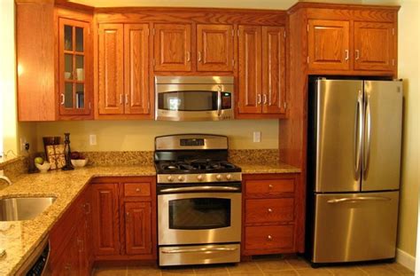 Looking for something brighter that might work with stainless steel appliances and a modern subway tile what paint color goes with oak cabinets? Kitchen Paint Colors With Oak Cabinets And Stainless Steel ...