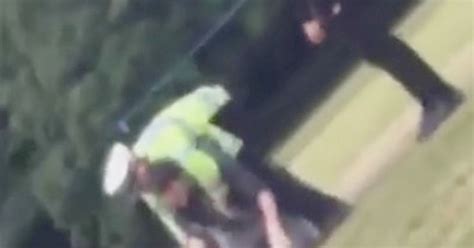Policeman Dragged Along Floor After He Confronts Gang For Flouting