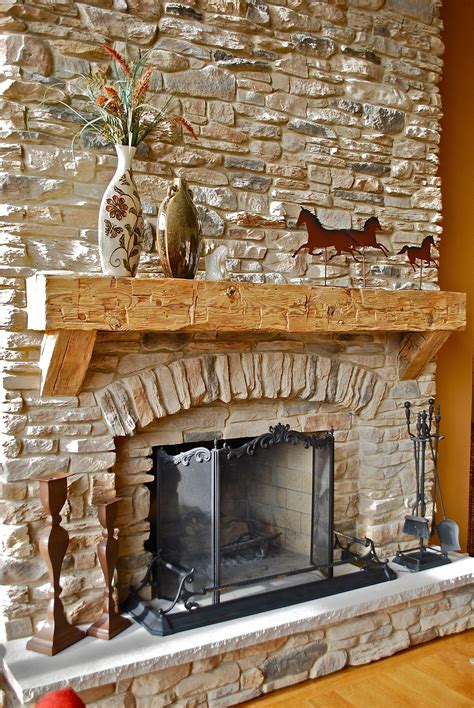 Fireplace Remodel With Stacked Stone And Rustic Wooden Mantel In This