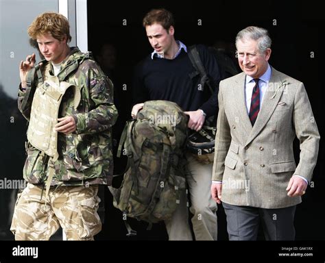 Prince Harry Leaves The Departures Terminal At Raf Brize Norton In Oxfordshire With His Father
