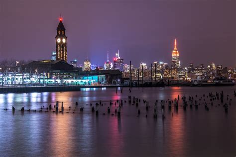 Hoboken Station And Manhattan Skyline By Night Noel Y Calingasan