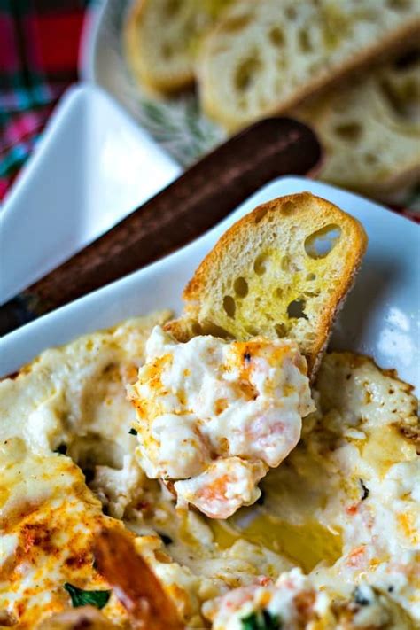 This is a really simple version that doesn't take long to make and can feed a crowd. Hot & Cheesy Cream Cheese Shrimp Dip | Life, Love, and ...