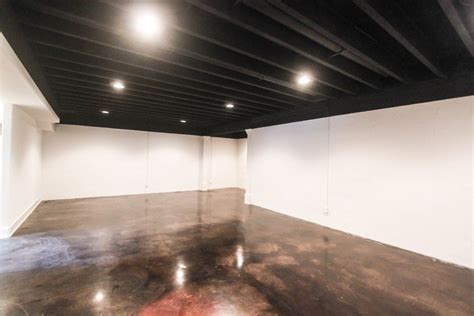 Industrial style basement basement industrial with ... Office decorating themes office designs.