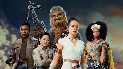 star wars the rise of skywalker chewbacca finn rey rose tico with background of dark sky and