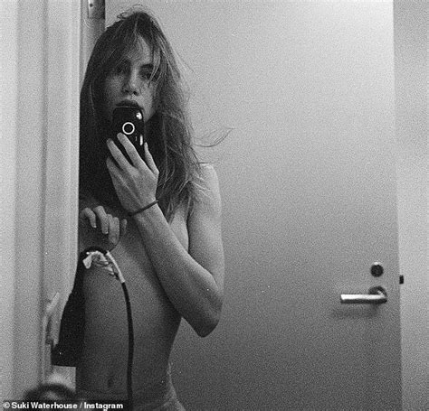Suki Waterhouse Stands Out From The Crowd In A Patterned Face Mask Top Daily Mail Online