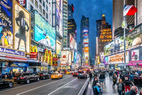 In 2013, the new york times made three corrections related to a vows story. Times Square buildings one-up each other with flashy LED signs