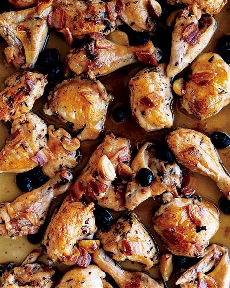 What to do with all of it? Tray of roast chicken pieces with pancetta, olives, herbs and garlic cloves #bestchickenrecipes ...