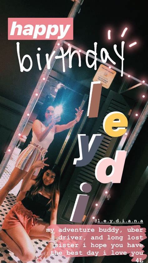 Two Women Are Posing In Front Of A Birthday Card