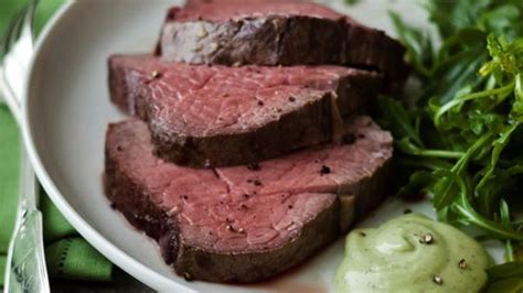 Beef tenderloin is a large cut of meat that, when sliced into steaks, is perhaps better known as filet mignon. Ina Garten's Slow-Roasted Filet of Beef with Basil Parmesan Mayonnaise. I usually skip the mayo ...