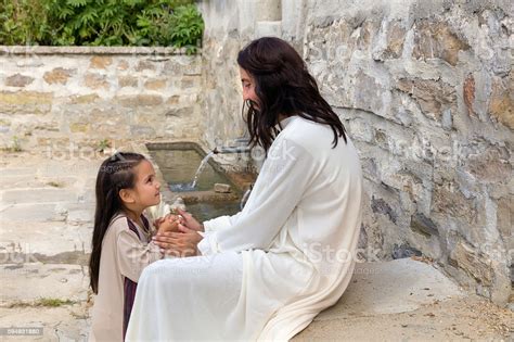 Jesus Praying With A Little Girl Stock Photo Download