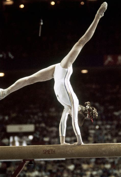 Nadia Comaneci Performs In The Balance Beam Competition At The Nadia