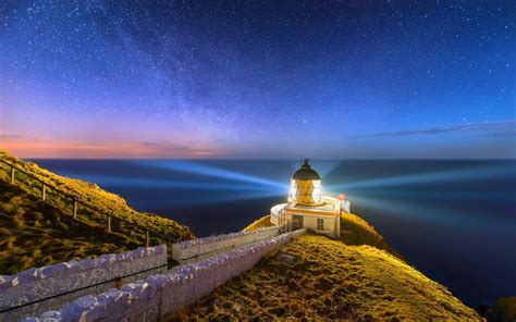 Lighthouse On Starry Night By Sarah White Image Abyss