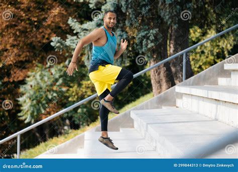 Dark Skinned Sportsman Running On The Stairs During Workout Stock Image