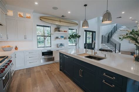 Painting your kitchen cabinets white is a smart design move that will likely keep you satisfied for years to come. Blue and White Coastal Kitchen - Waterview Kitchens