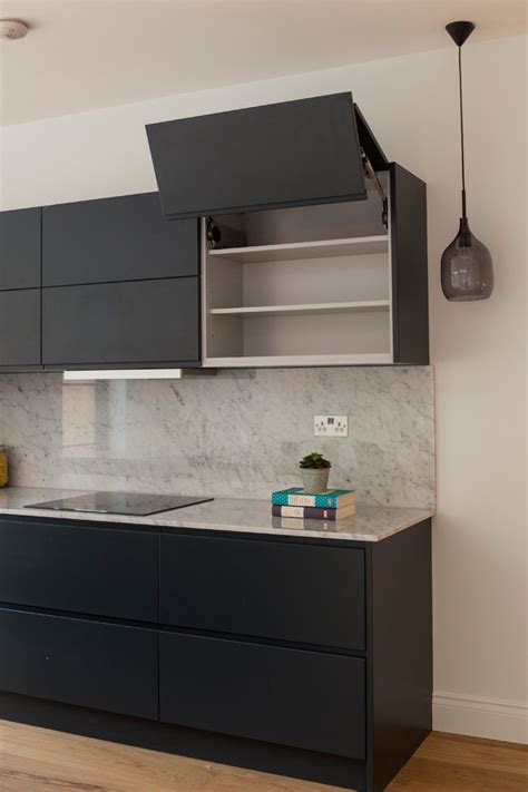 We are proud to have delivered over half a million orders since inception in 2009 and our customers are at the heart of everything we do. Dark Grey Modern Kitchen with Marble Effect Worktops ...