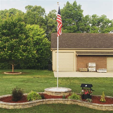 Maybe you would like to learn more about one of these? Flag pole and block flower bed | Flag pole landscaping ...
