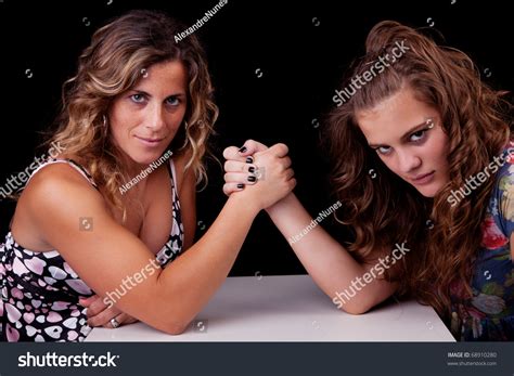 mother daughter wrestling isolated on black库存照片68910280 shutterstock