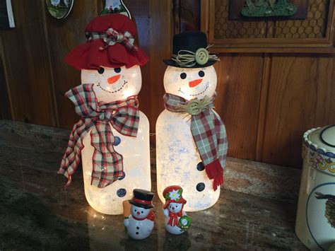 I Made These Snowmen Out Of Large Pickle Jars And Light Globes