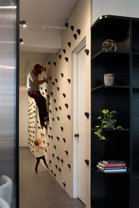 House with a climbing wall. This Apartment Features A Climbing Wall, A Chalky Blue ...