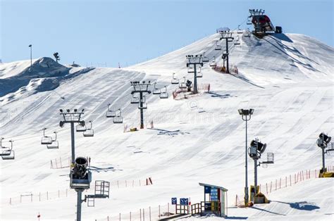 Ski Hill Ski Lift And Snow Making Machines At A Ski Resort Stock Image