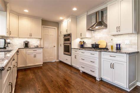 The cabinet interior is adequately protected from oil vapors that will typically attach to cabinet exteriors, so you can do as you like. Staining and Painting Kitchen Cabinets | Reliable Home Improvement