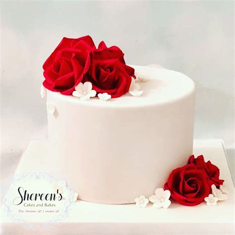 From design to execution, it really takes the cake. Ruby anniversary cake with ruby red roses | Anniversary ...