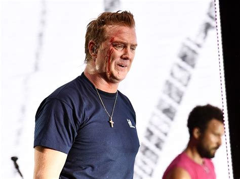 Queens Of The Stone Age Frontman Josh Homme Apologizes For Kicking Female Photographer In The