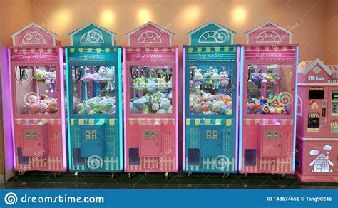 Discover more posts about machine doll. Row Of Toy Claw Crane Game Vending Machine Editorial Photo - Image of asian, center: 148674656