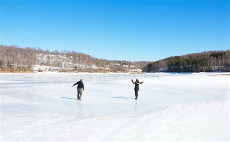 Couple Skating On The Frozen Lake Stock Image Image Of Movement