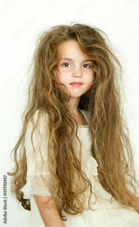 Little Girl With Long Messy Hair Stock Photo Adobe Stock