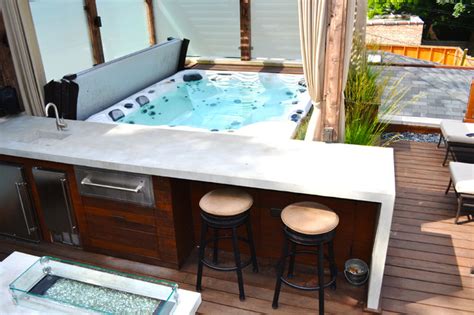 Hot tubs are that many people love to leave available year round, but are unfortunately often restricted by outside seasonal weather changes. Hot Tub Retreat - Contemporary - Deck - other metro - by ...