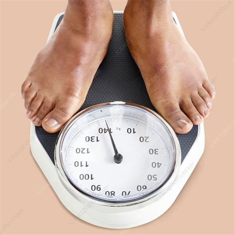 Man Standing On Weighing Scales Stock Image F0212319 Science