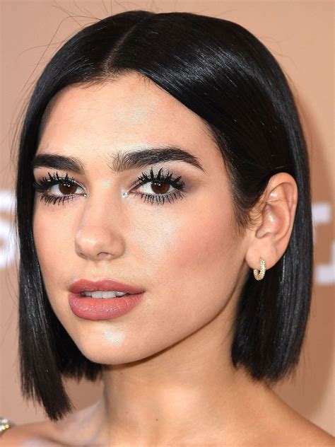 Dua Lipa Reveals New Haircut With Blunt Bangs See Photos Video Allure