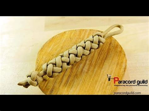 This is our first wide turk's head knot bracelet done with an interweave. Paracord key fob- 2 strand 4 bight gaucho knot