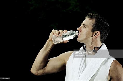 Healthy Man Drinking Water After Workout High Res Stock Photo Getty