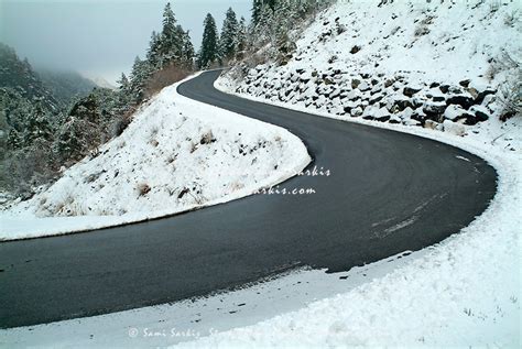 Winding Road Through A Snow Covered Valley Chabanon